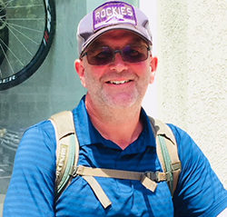 a man holding a fish