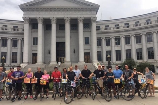 a group of people in front of a building