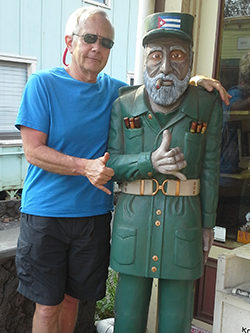 a man standing in front of a building